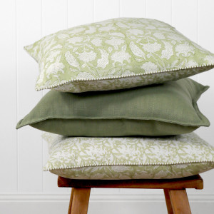 Sylvie Apple Green Reversible Cushion, shown as a soft decorative accent for layering on seating or a bed