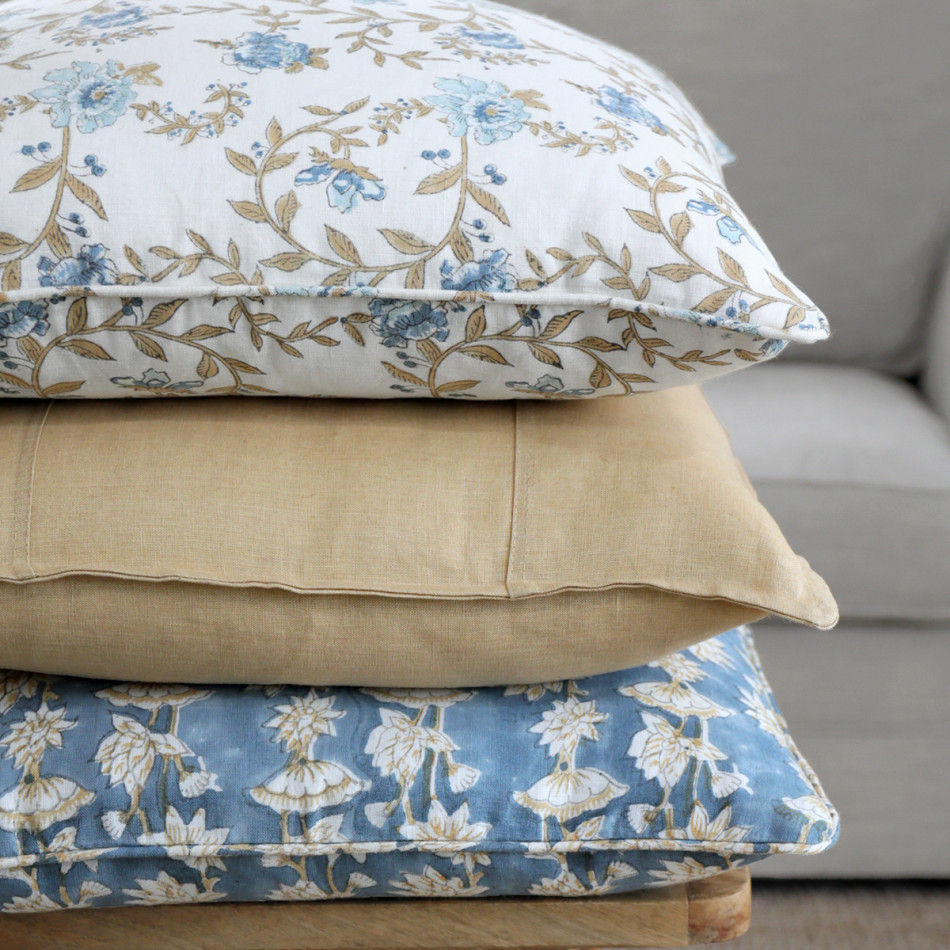 Golden Wheat Pure Linen Cushion, shown as a soft decorative accent for layering on seating or a bed