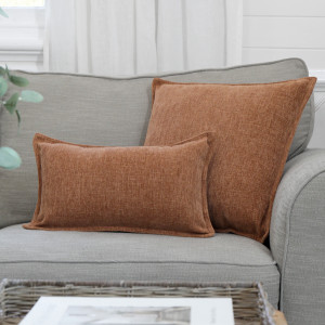 Lumbar Luca Paprika Chenille Cushion, shown as a soft decorative accent for layering on seating or a bed