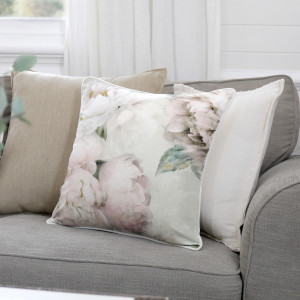 White Peony Velvet Cushion, shown as a soft decorative accent for layering on seating or a bed