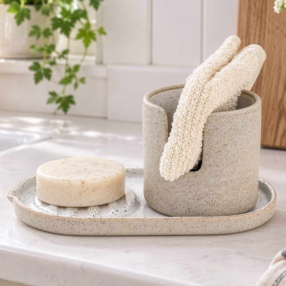 Brantham speckled ceramic sponge and soap holder styled with soap and cream dishcloths