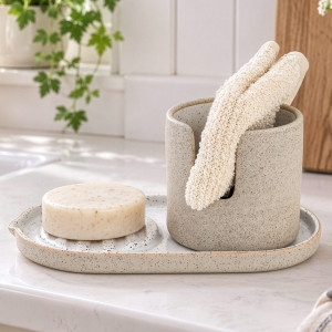 Brantham speckled ceramic sponge and soap holder styled with soap and cream dishcloths