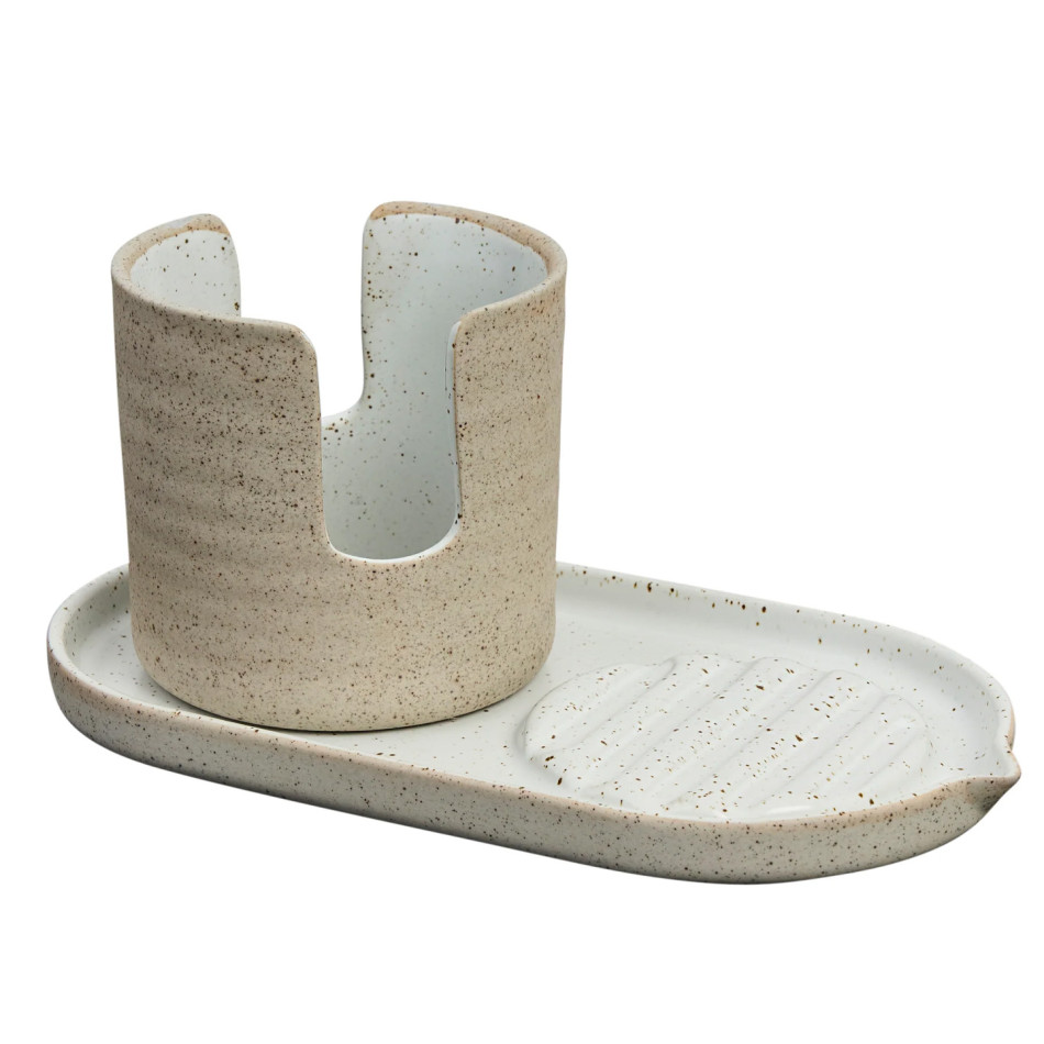 Empty two-piece ceramic sink caddy with tall sponge holder and ridged soap tray