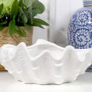 Large Clam Shell Bowl White Ceramic, a tabletop piece suited to serving food or creating a decorative display