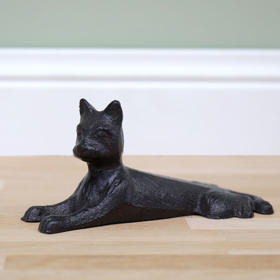 Cassie the Cat Door Wedge, a functional accent designed to hold a door in place