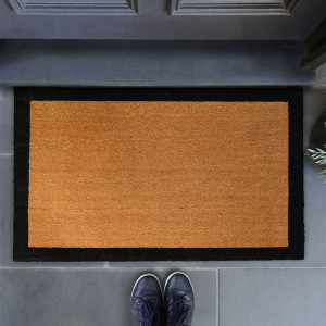 Harford natural coir doormat with a wide black border
