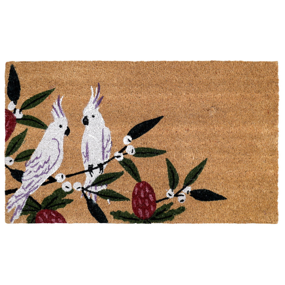 Rectangular natural coir doormat featuring two white cockatoos on leafy branches with burgundy blossoms