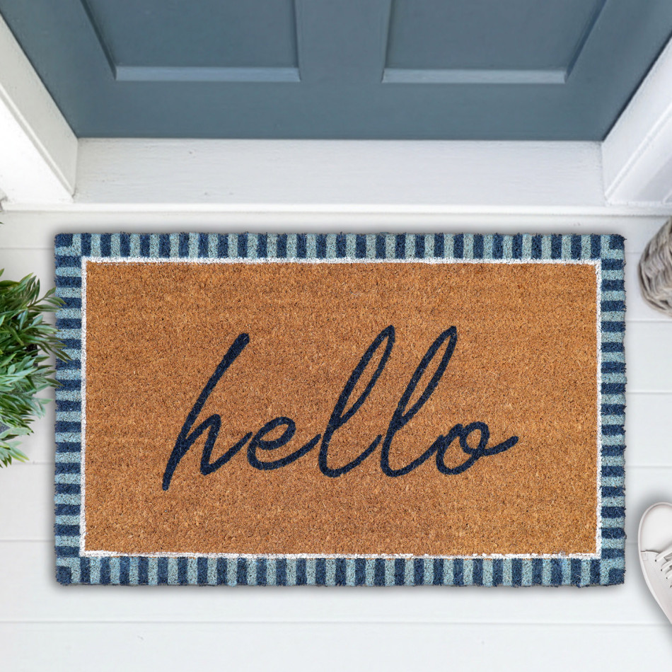 Coir doormat with navy hello lettering and a blue striped border beside a blue front door