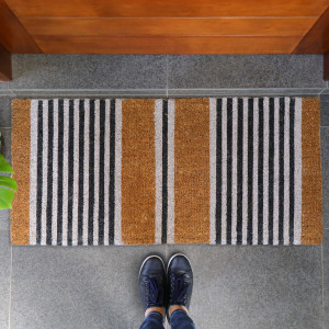Extra-large nautical striped doormat styled at a front doorway