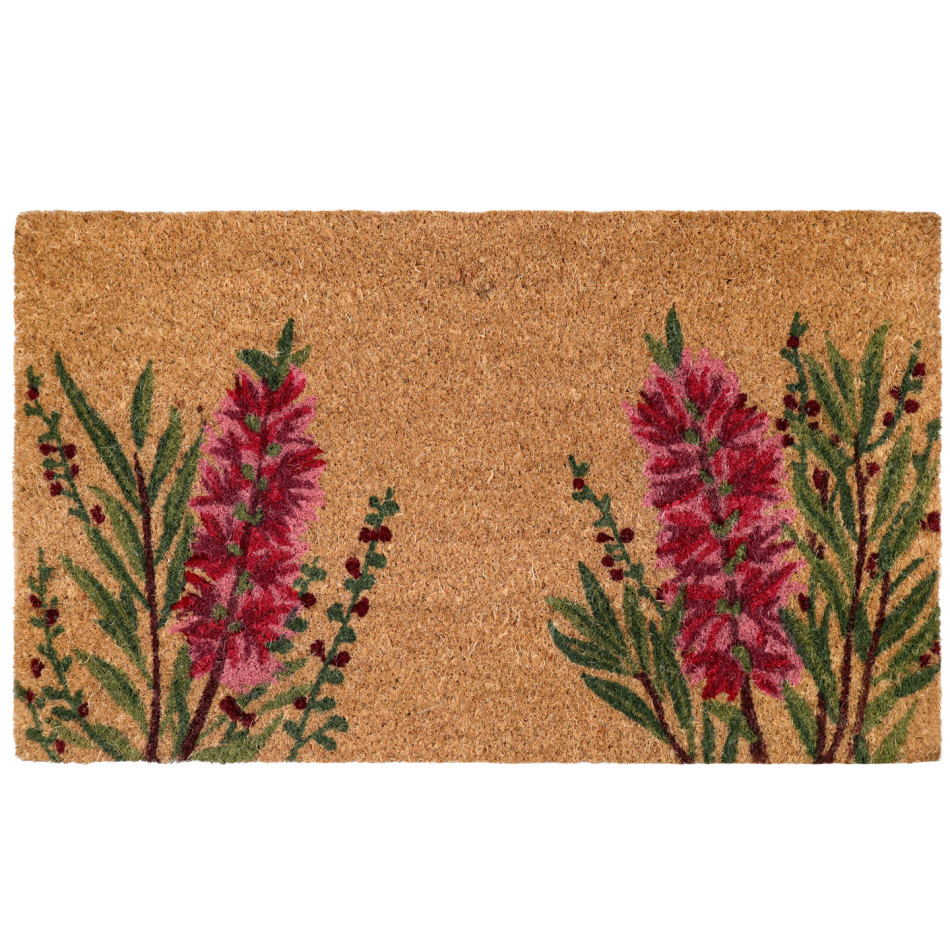 Rectangular natural coir door mat with red bottlebrush flowers and green leaves on a white background