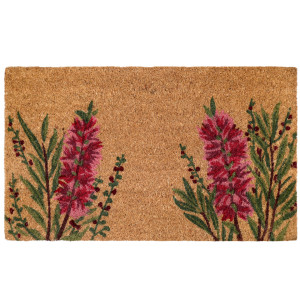 Rectangular natural coir door mat with red bottlebrush flowers and green leaves on a white background