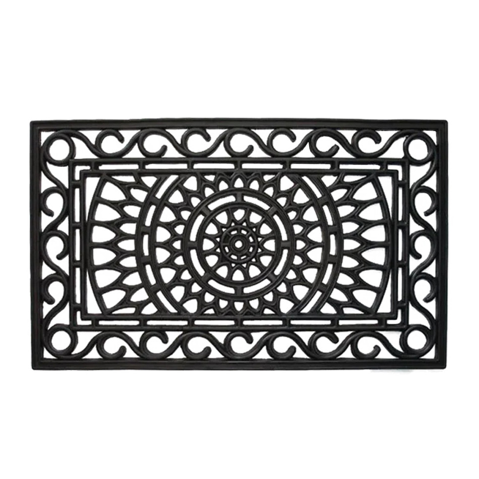 Black rectangular rubber doormat with an ornamental openwork scroll pattern