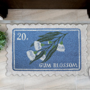 Pippa Blue Postage Stamp Doormat 80x50cm, designed to protect the floor while adding detail to an entryway