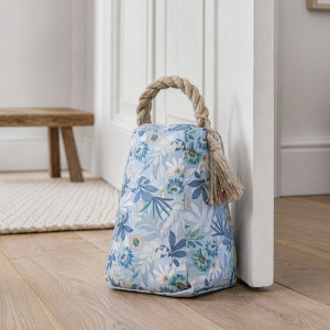 Annelise Cottage Garden Door Stop, a decorative floor accent made to keep a door securely positioned