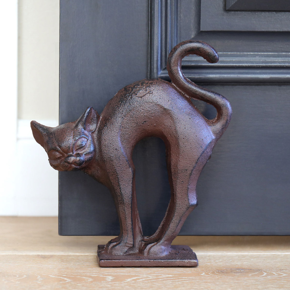 Arching Cat Doorstop - Vintage Cast Iron, a functional accent designed to hold a door in place