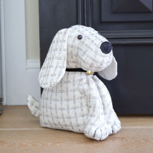 Bailey the Dog Door Stop, a decorative floor accent made to keep a door securely positioned