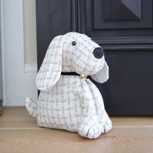 Bailey the Dog Door Stop, a functional accent designed to hold a door in place