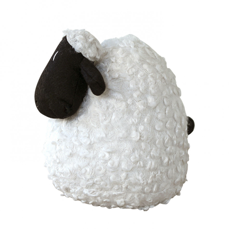 Sam the White Sheep Doorstop, a functional accent designed to hold a door in place