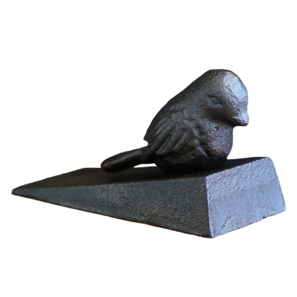 Brambling Bird Door Wedge, a functional accent designed to hold a door in place