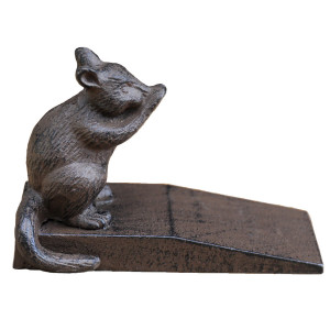 Clancy the Possum Door Wedge, a functional accent designed to hold a door in place