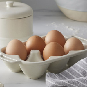 Darley Cream Ceramic Egg Tray, a tabletop piece suited to serving food or creating a decorative display