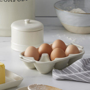 Darley Cream Ceramic Egg Tray, designed for practical dining use with an ornamental presentation