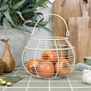 Croft Wire Produce Basket, designed as a versatile storage accent for an interior space