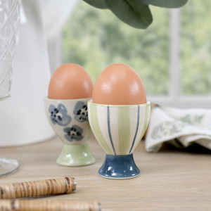 Isobel Green Stripe Egg Cup, a drinkware piece designed for serving beverages at the table