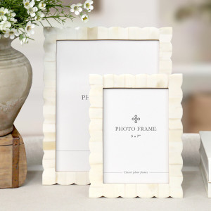 Laura photo frames showing natural cream tonal variation and textured edging