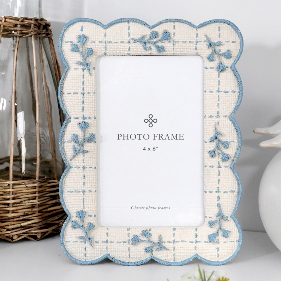 Bluebell floral 4x6 photo frame with scalloped cream edge and soft blue stitched details.