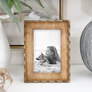 Marielle 4x6 inch wood frame displaying a black-and-white photo of a girl with a dog, beside a vase and lamp