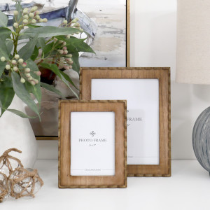 Marielle 8x10 and 5x7 inch natural wood photo frames displayed together on a white console
