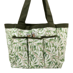 Greenhaven leaf-print gardener's bag on a garden table beside matching gloves and knee pad