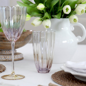 Set 4 Lavender Haze Fluted Water Glasses, a practical vessel for drinks with decorative tabletop appeal