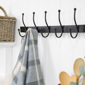 Ashmore Black Iron 5 Hook Coat Rack, a functional fitting for displaying, holding or organising household items