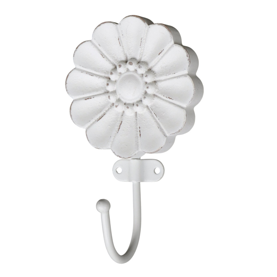 Angled view of the distressed white flower wall hook showing its curved metal hook