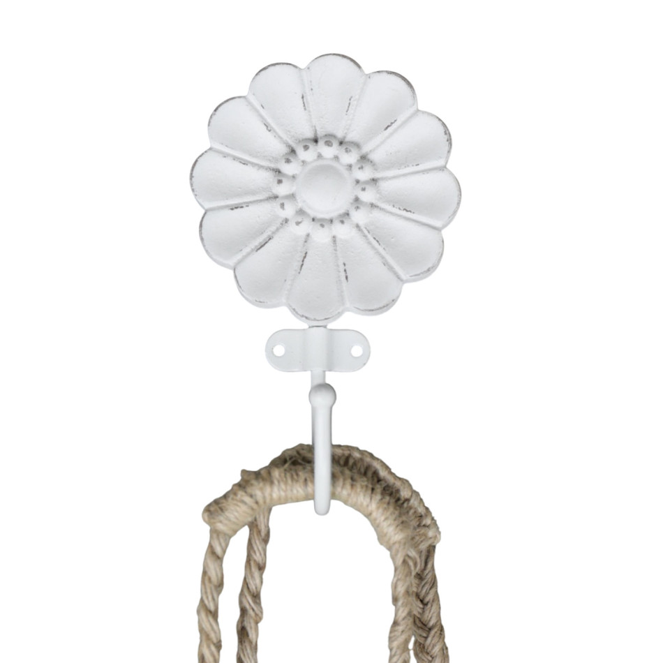 White floral wall hook holding a natural woven rope accessory