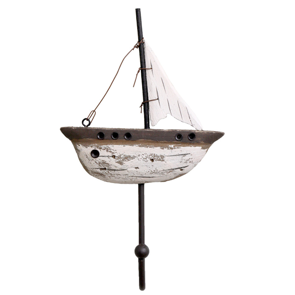 Regatta yacht wall hook with distressed white hull, sail, wire rigging and dark metal hook