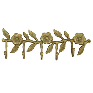 Fleur gold metal hook rack with sculpted flowers, leaves and five hooks on a white background