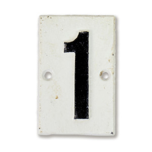 White cast iron Lambeth house number plaque with black numeral 1 and two mounting holes