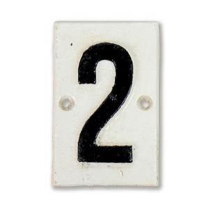 White cast iron Lambeth house number plaque with black numeral 2 and two mounting holes