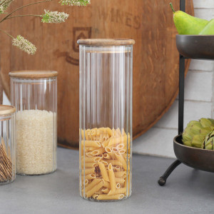 Tall Eleanor Fluted Glass Storage Jar, a drinkware piece designed for serving beverages at the table