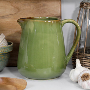 Olive-green reactive-glaze ceramic Bistrot jug styled on a kitchen bench.