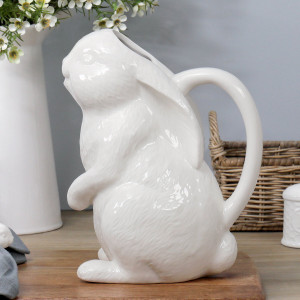 White ceramic rabbit-shaped jug with textured fur and a curved handle