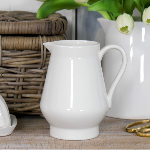 Payton White Porcelain Jug, a handled vessel suited to serving or displaying a flower arrangement