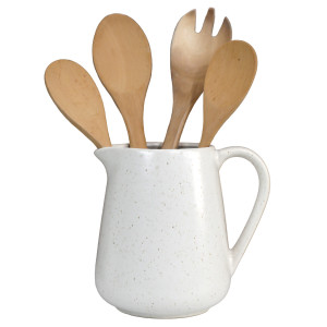 Off White ceramic Bistrot jug used as a utensil holder with wooden cooking utensils.