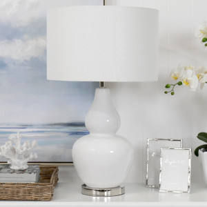Paloma table lamp styled beside a set of photo frames