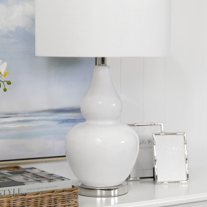 Paloma white table lamp with double-teardrop glass base and white drum shade