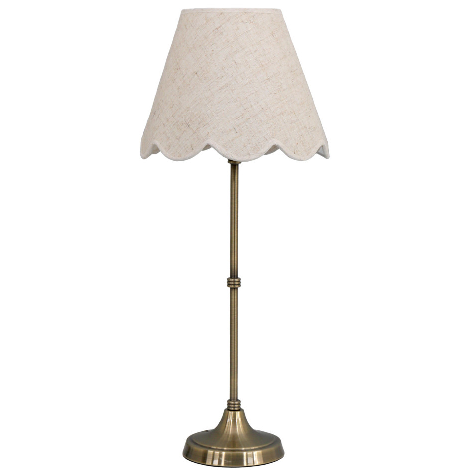 Claudia table lamp with slender antique gold metal base and scalloped linen shade against a white background