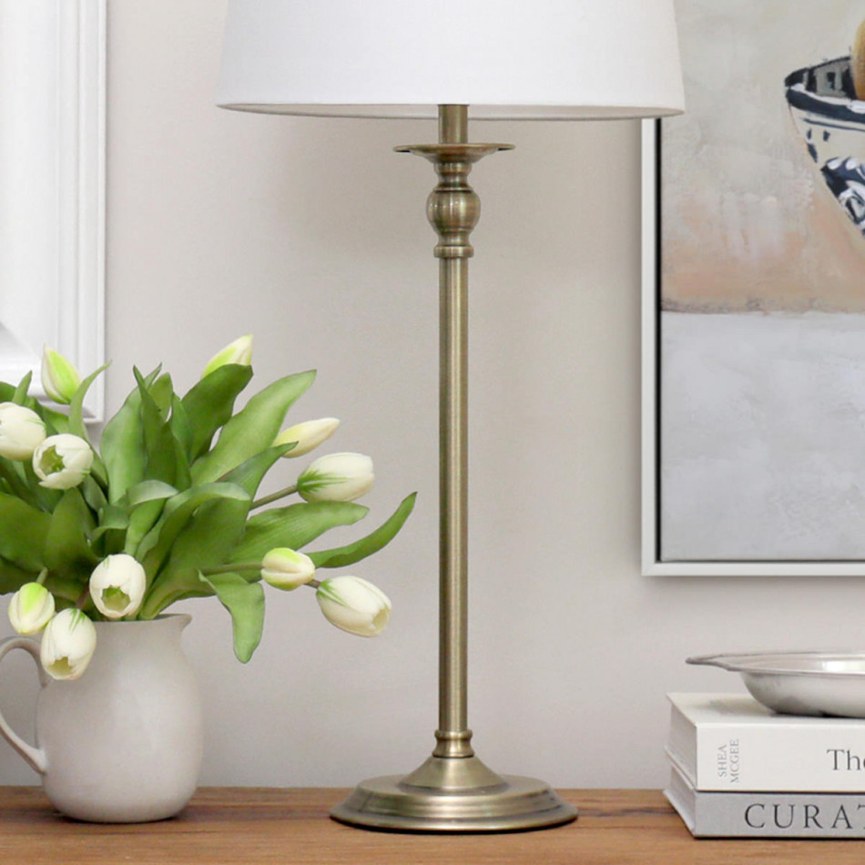 Coraline Antique Gold Table Lamp, an occasional furniture surface for display and everyday use